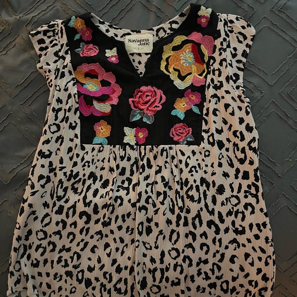 Leopard with flower shirt